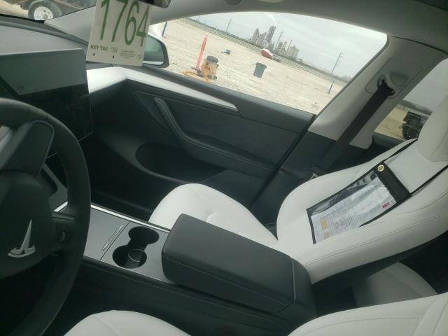 Photo 9 from auction – 2023 TESLA MODEL Y with VIN 7SAYGDEF6PF896807