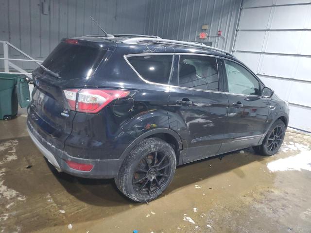 Photo 3 from auction – 2017 FORD ESCAPE SE with VIN 1FMCU9GD6HUD55690