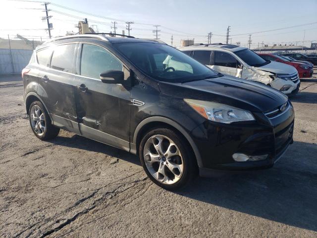 Foto 4 de la subasta – 2014 FORD ESCAPE TIT con VIN 1FMCU0J90EUE57496