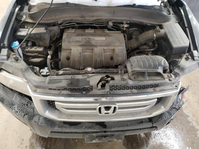 Photo 11 from auction – 2011 HONDA RIDGELINE with VIN 5FPYK1F52BB006142