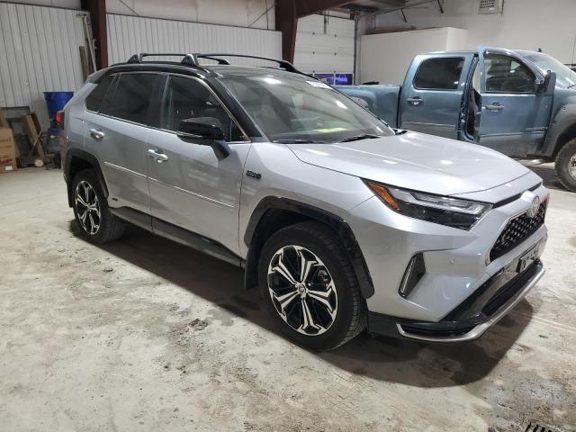 Photo 4 from auction – 2023 TOYOTA RAV4 PRIME with VIN JTMFB3FV0PD158429
