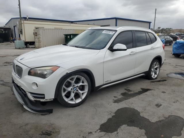 BMW X1 SDRIVE2 2015 with VIN WBAVM1C54FVW56864 - Photo from auction