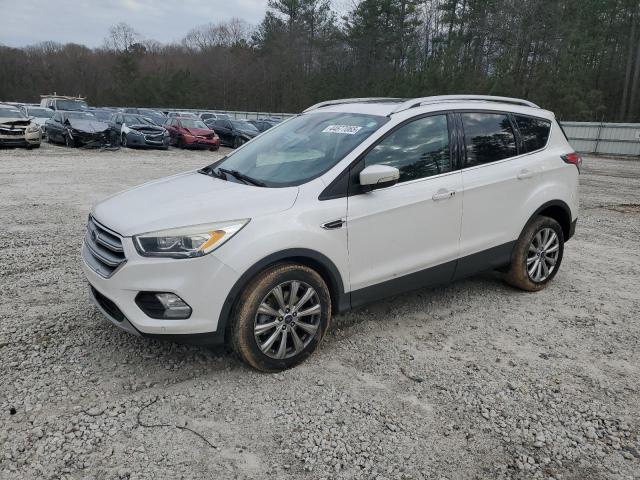 FORD ESCAPE TIT 2017 with VIN 1FMCU0J95HUA88283 - Photo from auction