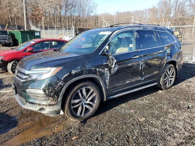HONDA PILOT ELIT 2017 with VIN 5FNYF6H04HB071482 - Photo from auction