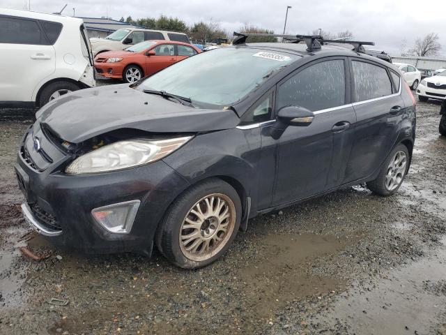 FORD FIESTA SES 2011 with VIN 3FADP4FJ3BM212546 - Photo from auction
