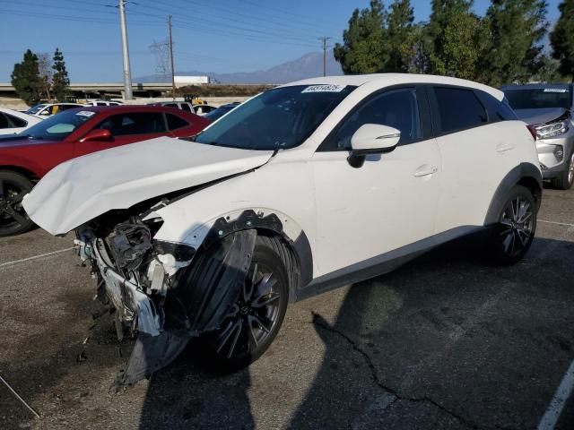 MAZDA CX-3 TOURI 2018 with VIN JM1DKDC77J0318422 - Photo from auction