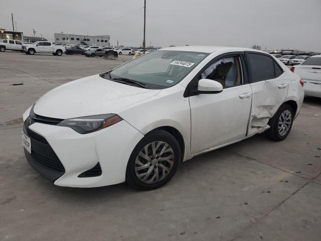 TOYOTA COROLLA L 2018 with VIN 5YFBURHE5JP754830 - Photo from auction