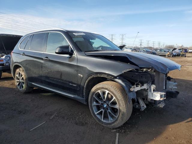 Photo 4 from auction – 2015 BMW X5 XDRIVE3 with VIN 5UXKR0C5XF0P16692