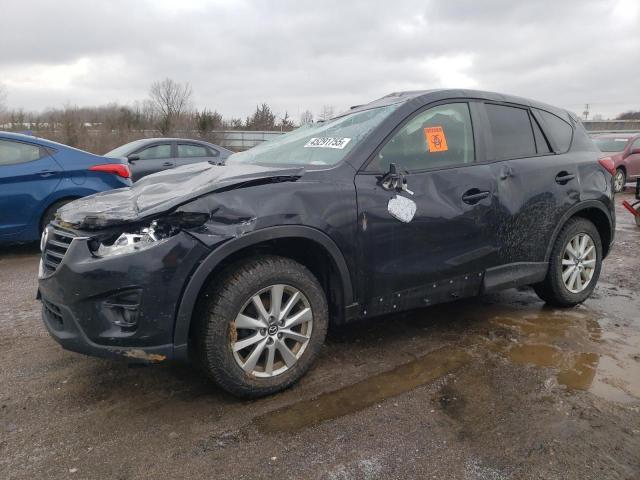 MAZDA CX-5 TOURI 2016 with VIN JM3KE4CY8G0665216 - Photo from auction