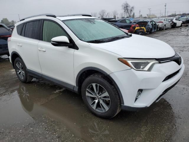 Photo 4 from auction – 2017 TOYOTA RAV4 XLE with VIN JTMWFREV9HJ139048