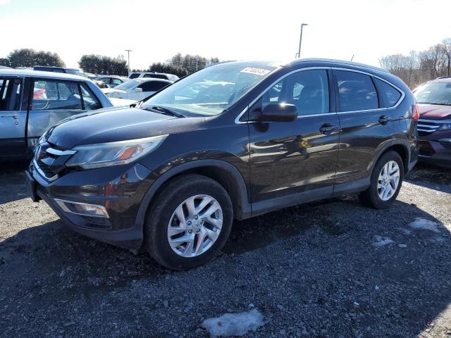 HONDA CR-V EXL 2015 with VIN 2HKRM4H75FH700340 - Photo from auction