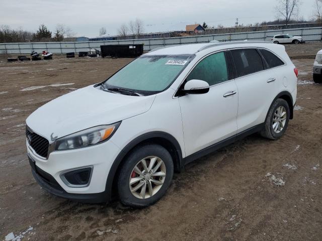 KIA SORENTO LX 2016 with VIN 5XYPG4A36GG019991 - Photo from auction