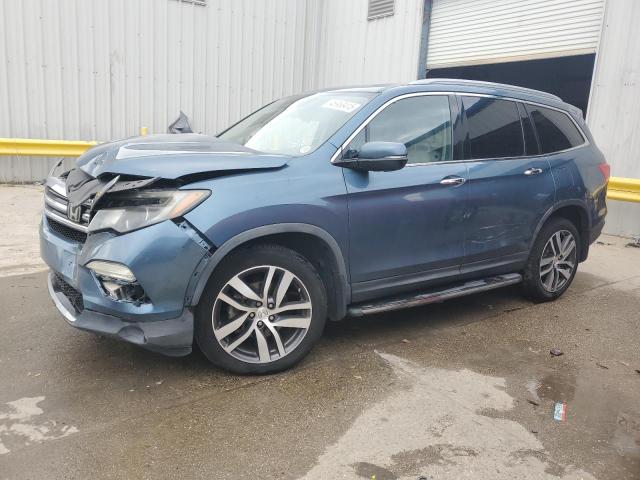 HONDA PILOT TOUR 2016 with VIN 5FNYF5H95GB056612 - Photo from auction