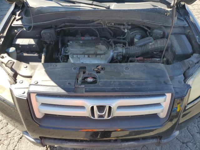 Photo 12 from auction – 2006 HONDA PILOT EX with VIN 5FNYF285X6B033238