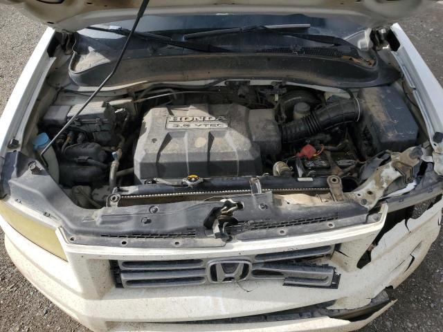 Photo 11 from auction – 2006 HONDA RIDGELINE with VIN 2HJYK16596H520798