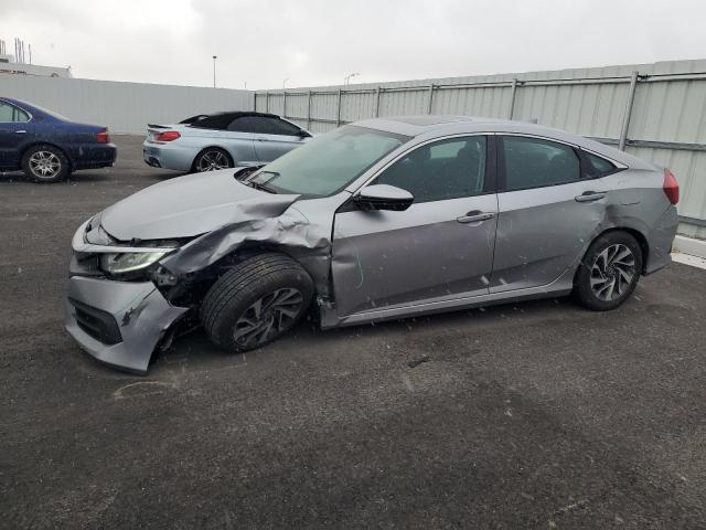 HONDA CIVIC EX 2017 with VIN 19XFC2F75HE218861 - Photo from auction