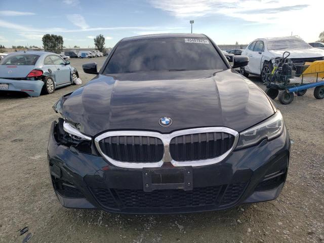 Photo 5 from auction – 2021 BMW 330I with VIN 3MW5R1J0XM8B73677