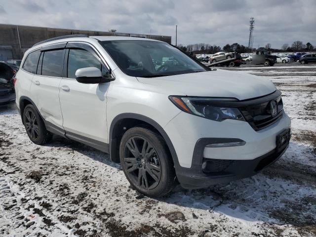 Photo 4 from auction – 2022 HONDA PILOT SE with VIN 5FNYF5H21NB027897