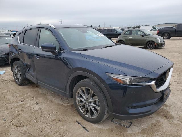 Photo 4 from auction – 2021 MAZDA CX-5 SIGNA with VIN JM3KFBEY9M0343758
