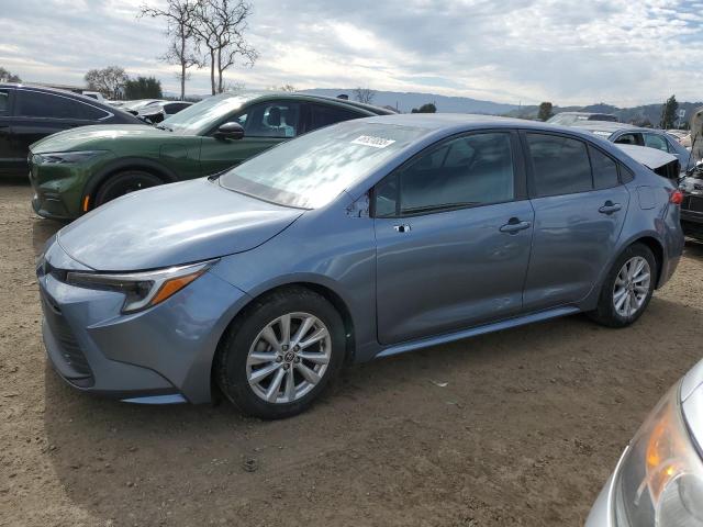 TOYOTA COROLLA LE 2023 with VIN JTDBCMFE0P3007159 - Photo from auction