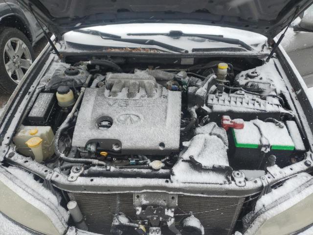 Photo 11 from auction – 2002 INFINITI I35 with VIN JNKDA31AX2T012597