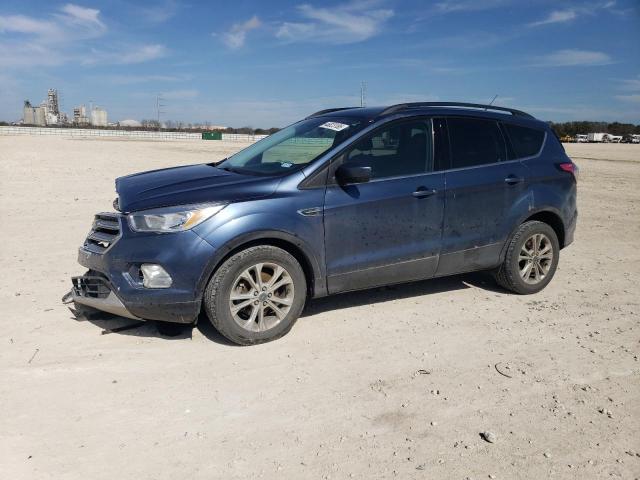FORD ESCAPE SE 2018 with VIN 1FMCU0GD0JUA54401 - Photo from auction