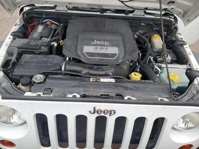 Photo 12 from auction – 2013 JEEP WRANGLER U with VIN 1C4BJWDG3DL626713