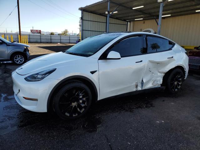 TESLA MODEL Y 2022 с VIN 7SAYGDEE0NF386280 - Снимка от търг