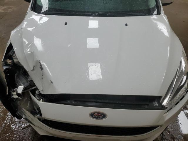 Photo 11 from auction – 2018 FORD FOCUS SE with VIN 1FADP3F29JL250981
