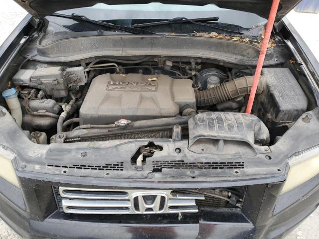 Photo 11 from auction – 2007 HONDA RIDGELINE with VIN 2HJYK16297H549032