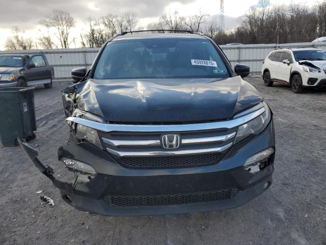 Photo 5 from auction – 2016 HONDA PILOT EX with VIN 5FNYF6H40GB117584