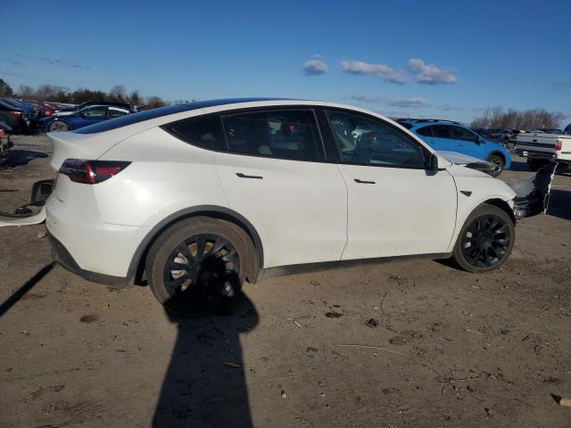 Photo 3 from auction – 2023 TESLA MODEL Y with VIN 7SAYGAEE9PF795914