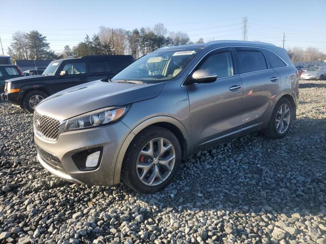 KIA SORENTO SX 2016 with VIN 5XYPK4A54GG184891 - Photo from auction