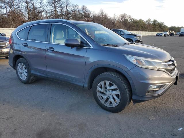 Photo 4 from auction – 2015 HONDA CR-V EXL with VIN 2HKRM4H76FH634610