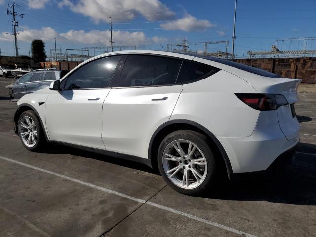Photo 2 from auction – 2023 TESLA MODEL Y with VIN 7SAYGDEE6PA062833