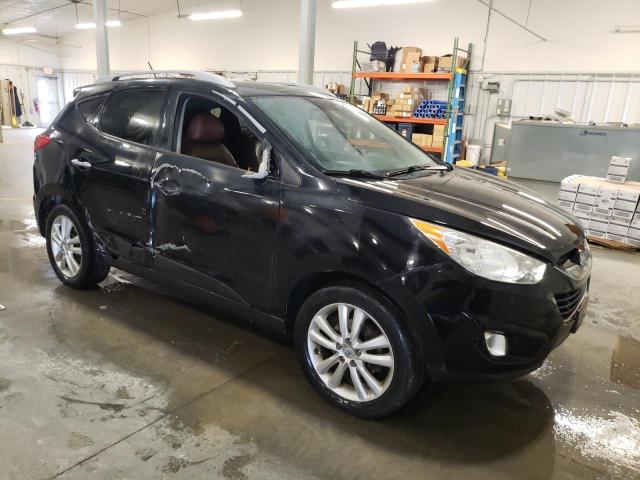 Photo 4 from auction – 2011 HYUNDAI TUCSON GLS with VIN KM8JUCAC5BU315970