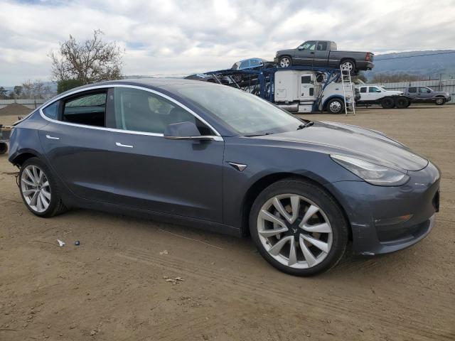 Снимка 4 от търг – 2018 TESLA MODEL 3 с VIN 5YJ3E1EA5JF017675