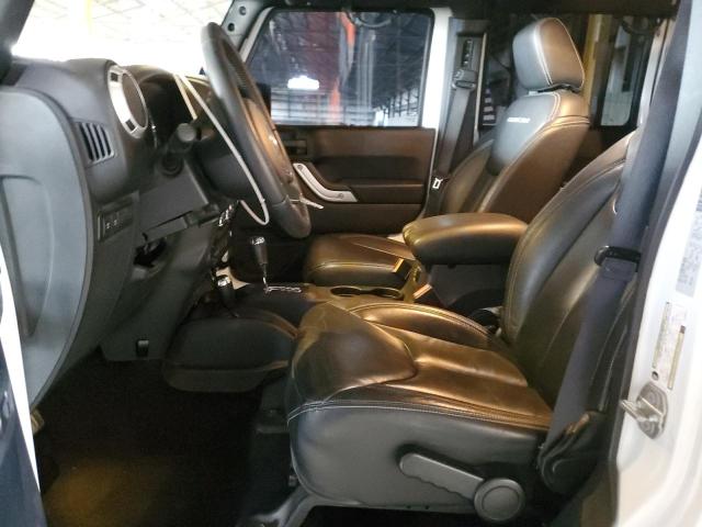 Photo 7 from auction – 2016 JEEP WRANGLER U with VIN 1C4BJWFG6GL106216