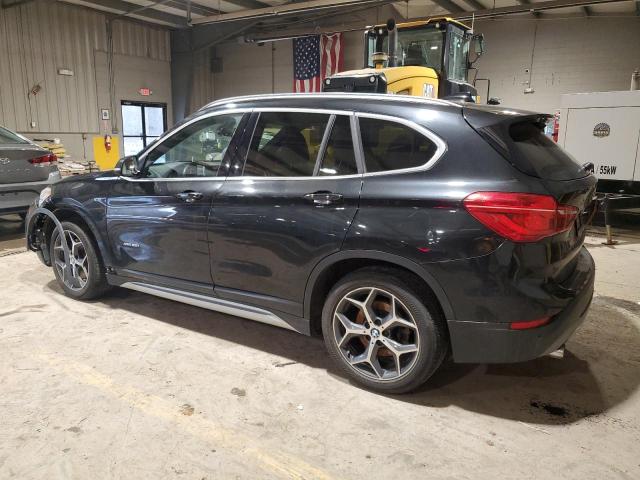 Photo 2 from auction – 2016 BMW X1 XDRIVE2 with VIN WBXHT3C32G5E51404