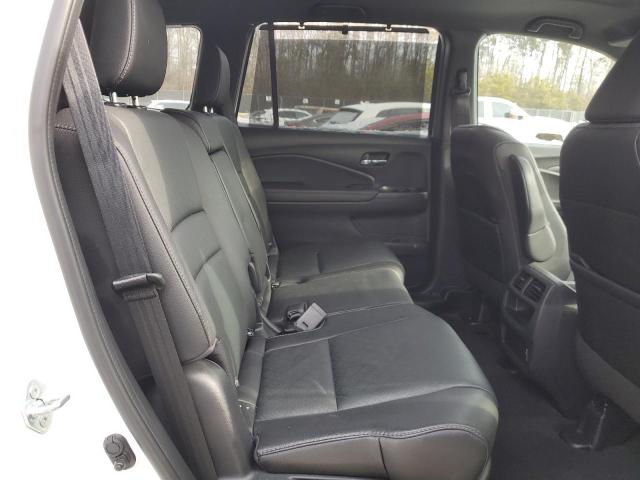 Photo 11 from auction – 2021 HONDA PASSPORT E with VIN 5FNYF8H59MB010288
