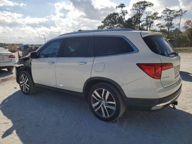 Photo 2 from auction – 2017 HONDA PILOT TOUR with VIN 5FNYF5H97HB042647
