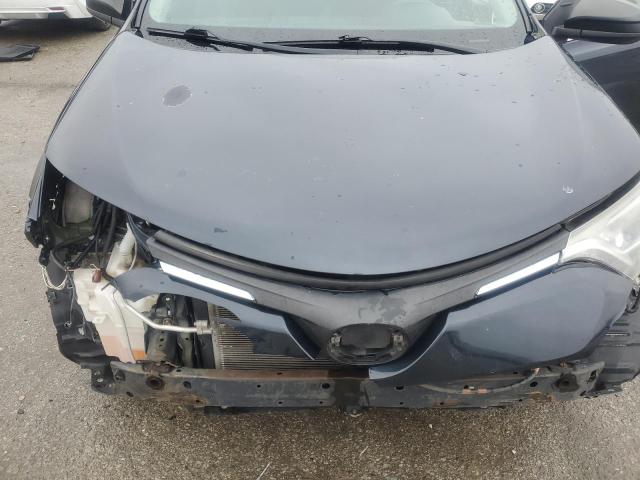 Photo 12 from auction – 2018 TOYOTA RAV4 LE with VIN 2T3ZFREV8JW439376