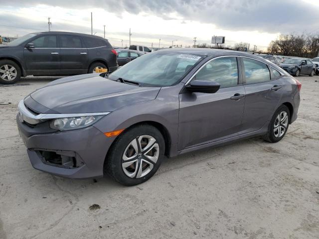 HONDA CIVIC LX 2018 with VIN 19XFC2F52JE011610 - Photo from auction