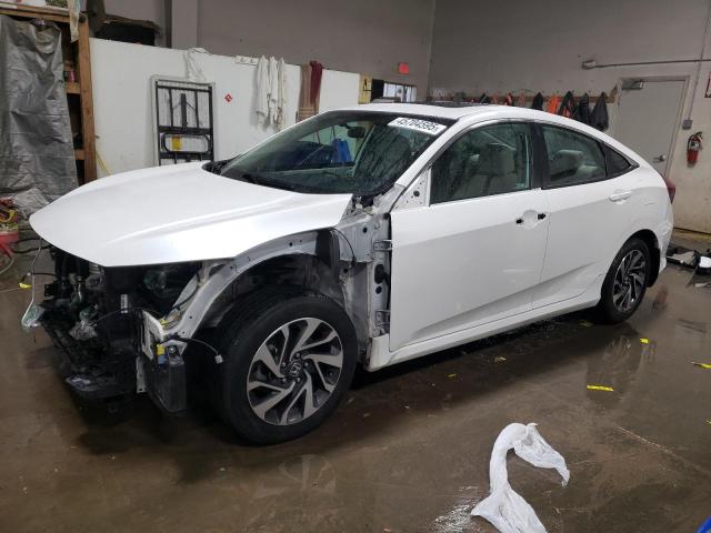HONDA CIVIC EX 2018 with VIN 19XFC2F75JE017614 - Photo from auction