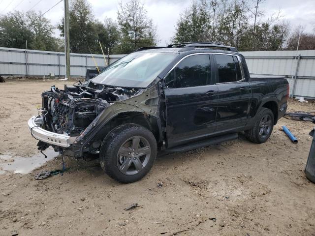Photo 1 from auction – 2023 HONDA RIDGELINE with VIN 5FPYK3F59PB057849