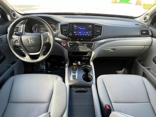 Photo 9 from auction – 2023 HONDA RIDGELINE with VIN 5FPYK3F54PB046791