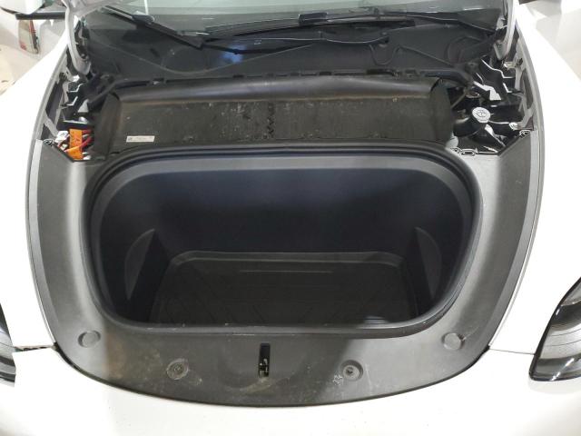 Photo 11 from auction – 2023 TESLA MODEL Y with VIN 7SAYGDEE6PF689471