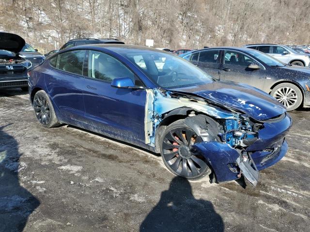 Снимка 4 от търг – 2022 TESLA MODEL 3 с VIN 5YJ3E1EC2NF244331