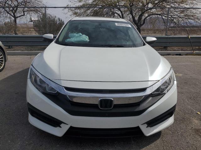 Photo 5 from auction – 2018 HONDA CIVIC EX with VIN 19XFC2F73JE012332