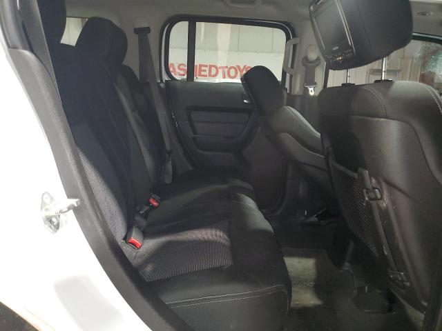 Photo 11 from auction – 2009 HUMMER H3 with VIN 5GTEN13E098129772